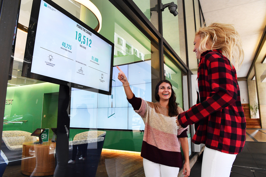 Pavegen energy walkway data screen with people jumping