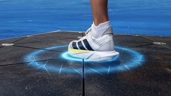 Foot on Pavegen Kinetic Tile with Energy