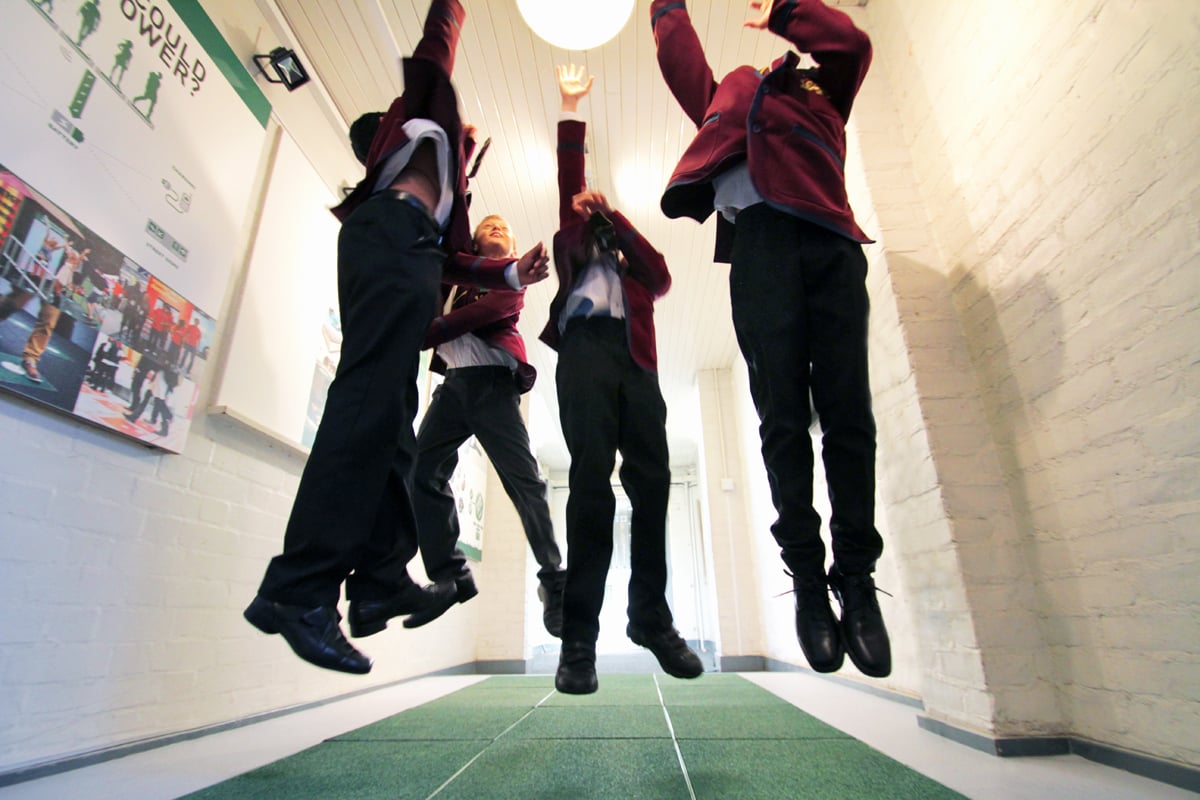 School children jumping on Pavegen energy tiles
