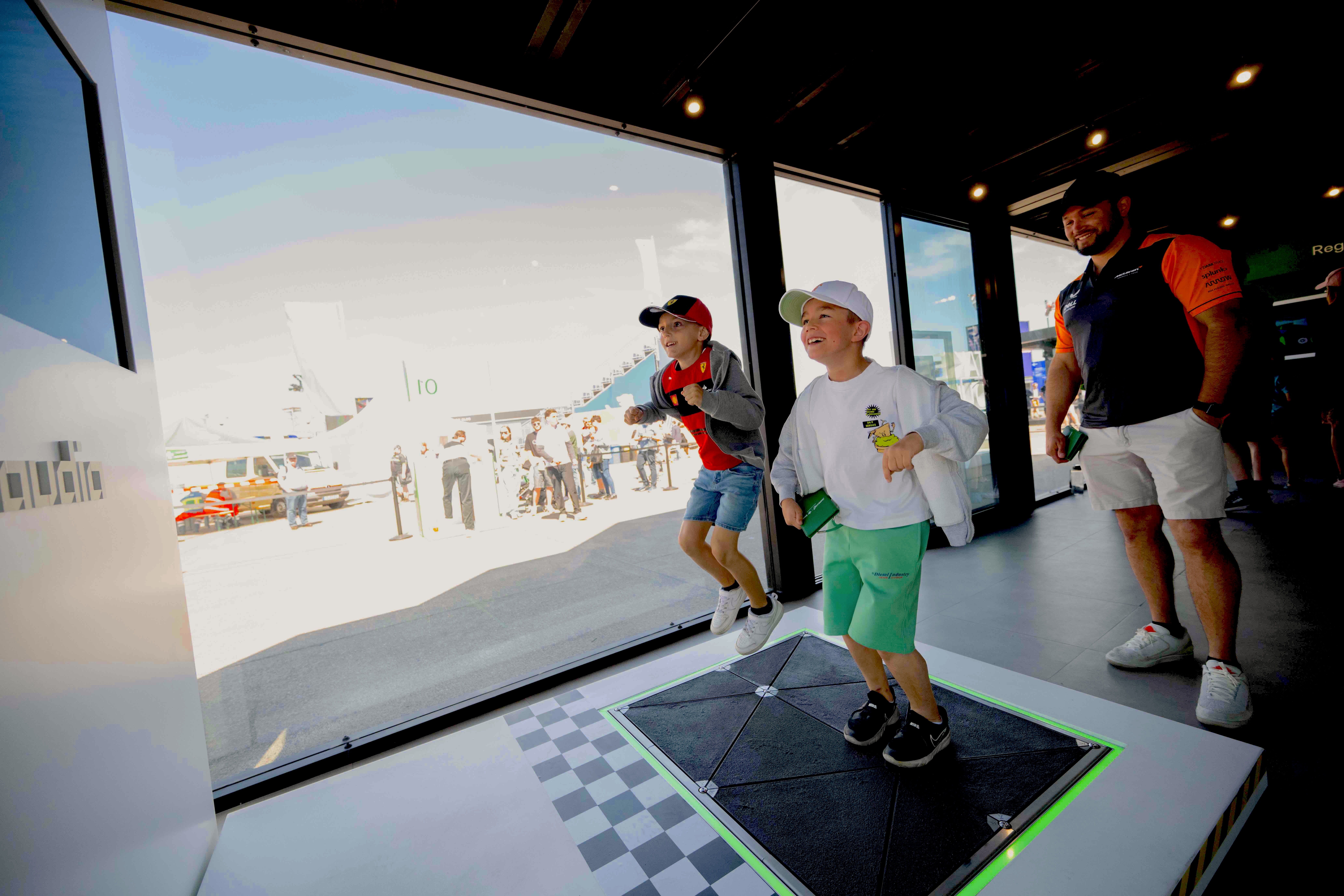 1mb_Pavegen Saudia Formula E Gamestation_Berlin_ 2 kids and dad-1-1